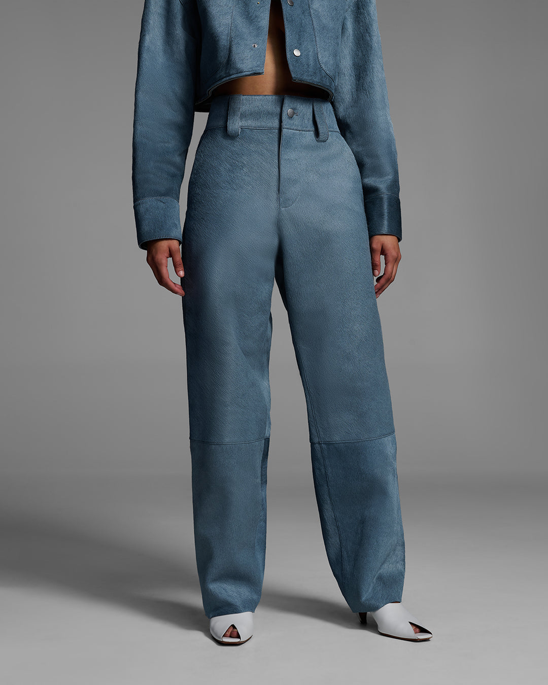 Detail photo of hair-on cowhide pant in storm blue.  #color_storm
